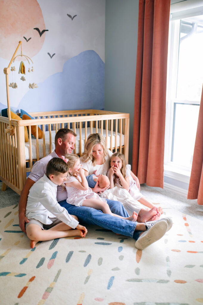 with mom, dad, brother and sisters newborn portrait by McKinney Texas newborn photographer