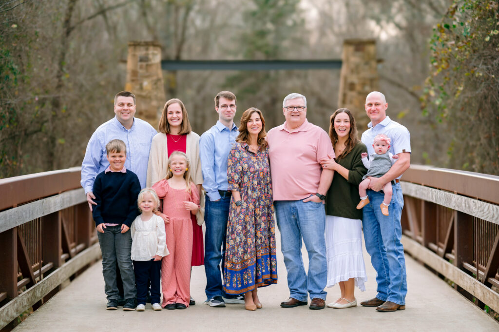 Extended family photoshoot on bridge at Oak Point Park in Plano, Texas with Jennifer L Kirk Photography.